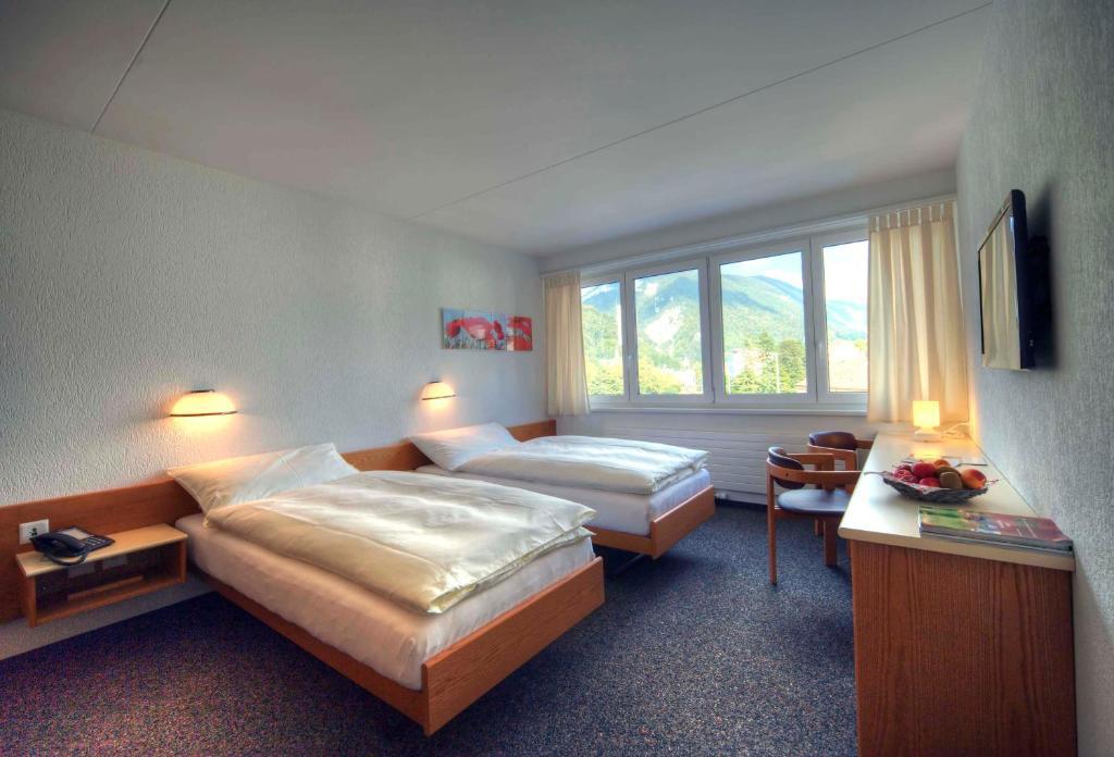 Hotel Oasis Moutier Habitación foto